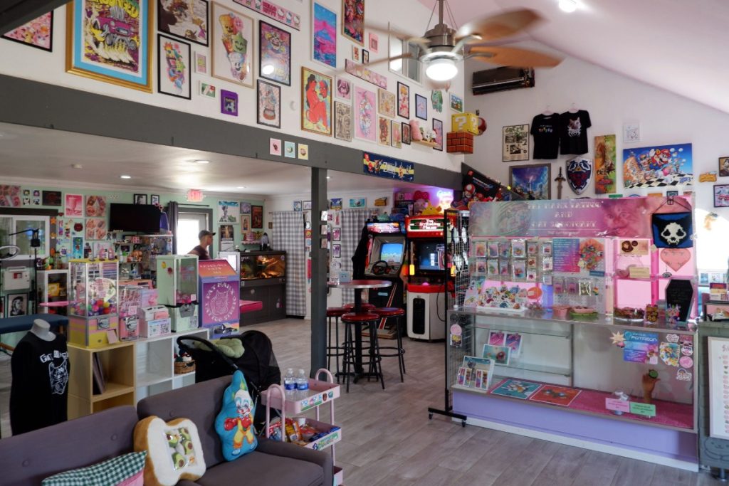 The interior of Fat Manx features artwork and bright pops of color, with video game machines, toy dispensers and other unique touches adding to the creative atmosphere. 